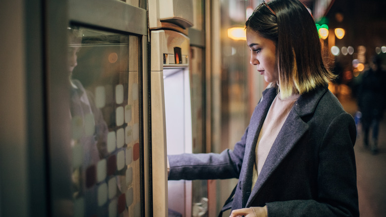 Woman at an ATM